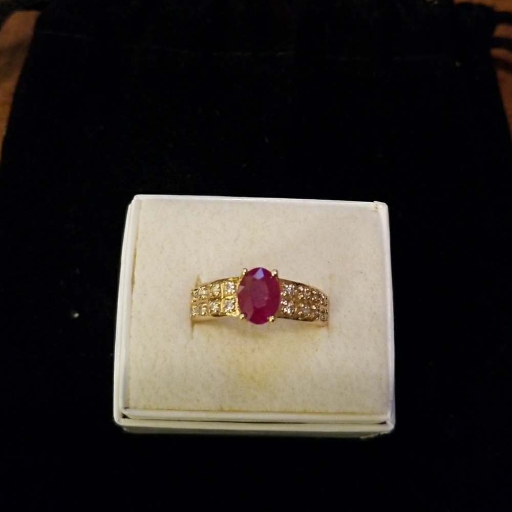 14k ruby ring and 16 diamonds, Size 7.5